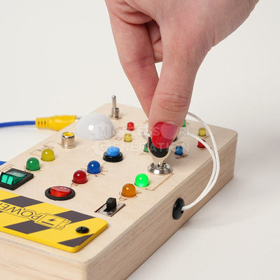 Tableau Montessori en bois avec interrupteurs